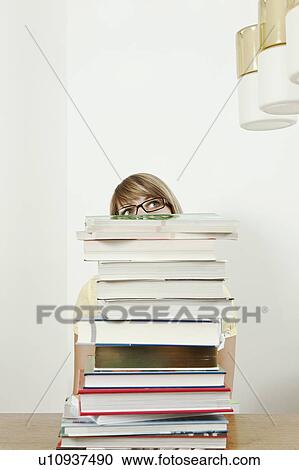 Female student with stack of books View Large Photo Image Stock Image - Female student with stack of books. Fotosearch