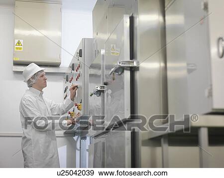 Food Worker At Control Panel View Large Photo Image Stock Photo - Food Worker At Control Panel. Fotosearch