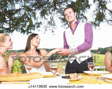 friends having dinner outside View Large Photo Image Stock Image - friends having dinner outside. Fotosearch