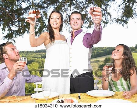 friends having dinner outside View Large Photo Image Stock Image - friends having dinner outside. Fotosearch