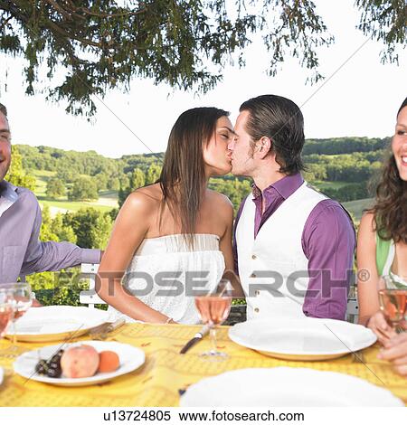 friends having dinner outside View Large Photo Image Stock Photography - friends having dinner outside. Fotosearch