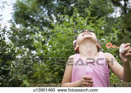 Stock Image - Fun with Bubbles. Fotosearch