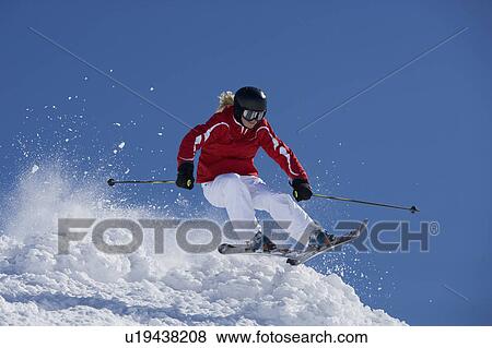 Girl in red getting air time. View Large Photo Image Stock Photo - Girl in red getting air time.. Fotosearch