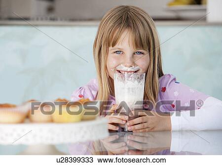 Girl with chocolate milkshake and cream View Large Photo Image Stock Image - Girl with chocolate milkshake and cream. Fotosearch