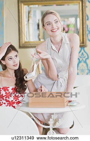 girls after a successful shopping day View Large Photo Image Stock Photo - girls after a successful shopping day. Fotosearch