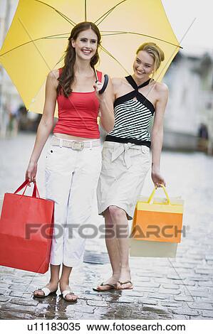 girls having fun in the rain View Large Photo Image Stock Photography - girls having fun in the rain. Fotosearch