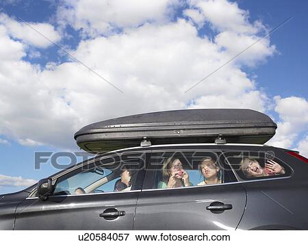 girls making faces in car View Large Photo Image Stock Photo - girls making faces in car. Fotosearch