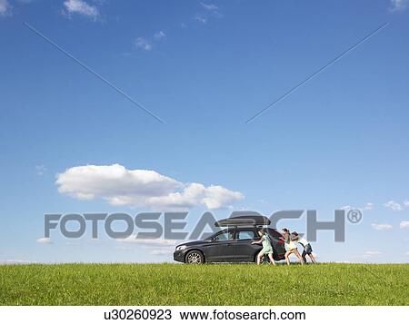 girls pushing car View Large Photo Image Stock Image - girls pushing car. Fotosearch