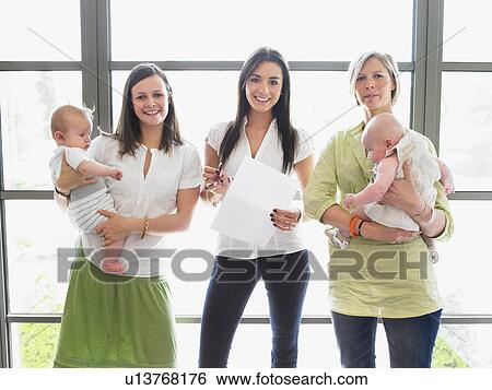 Stock Photograph - group of women with babies. Fotosearch