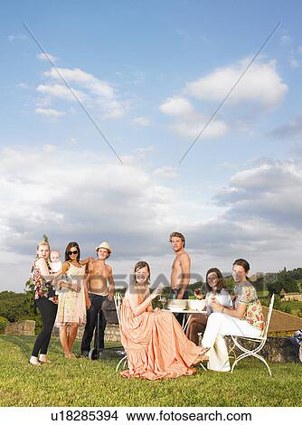 group of young people at barbecue View Large Photo Image Picture - group of young people at barbecue. Fotosearch