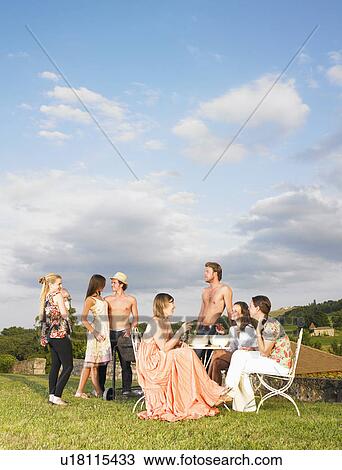 group of young people at barbecue View Large Photo Image Stock Image - group of young people at barbecue. Fotosearch