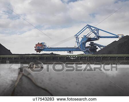 Stock Image - Heavy Machinery At Port. Fotosearch