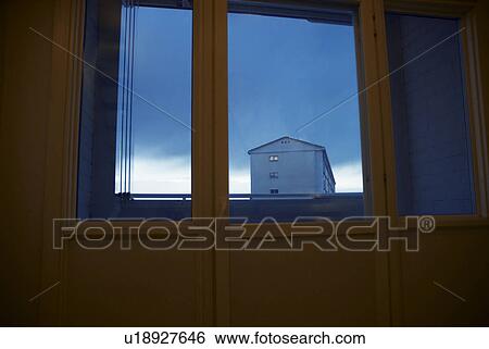 House framed in window View Large Photo Image Stock Photograph - House framed in window. Fotosearch