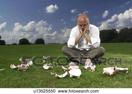 man and smashed piggy banks View Large Photo Image Stock Image - man and smashed piggy banks. Fotosearch