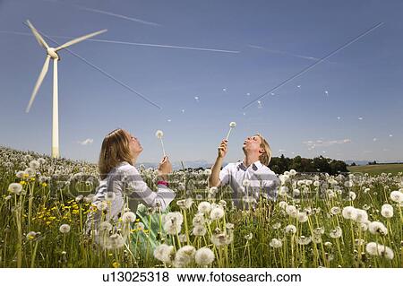 man and woman at wind turbine View Large Photo Image Stock Photo - man and woman at wind turbine. Fotosearch