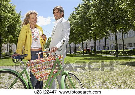 Man and woman having lunch break View Large Photo Image Stock Photo - Man and woman having lunch break. Fotosearch