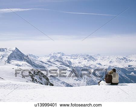 man and woman looking out from mountain View Large Photo Image Stock Image - man and woman looking out from mountain. Fotosearch