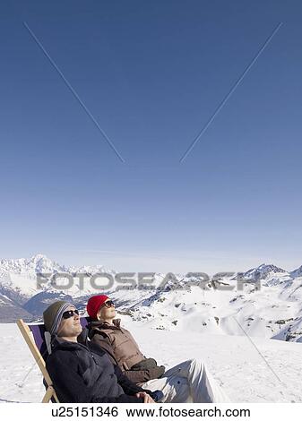 man and woman on deck chair up mountain View Large Photo Image Stock Photograph - man and woman on deck chair up mountain. Fotosearch