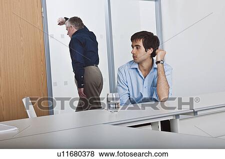 man consoling work colleague View Large Photo Image Stock Photo - man consoling work colleague. Fotosearch