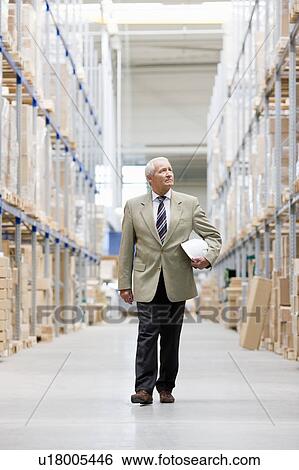 man in charge in storage View Large Photo Image Stock Photograph - man in charge in storage. Fotosearch