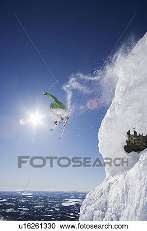 Man in green airing a gap. View Large Photo Image Stock Image - Man in green airing a gap.. Fotosearch