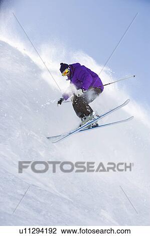 Man in purple dropping backwards. View Large Photo Image Stock Image - Man in purple dropping backwards.. Fotosearch