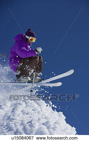 Man in purple getting air. View Large Photo Image Stock Photo - Man in purple getting air.. Fotosearch