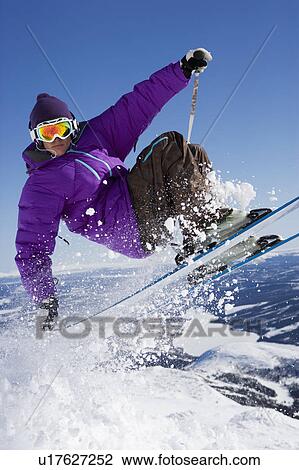 Stock Image - Man in purple tail grabbing.. Fotosearch