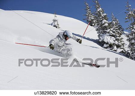 Man in white & grey camo suit carving. View Large Photo Image Stock Image - Man in white & grey camo suit carving.. Fotosearch