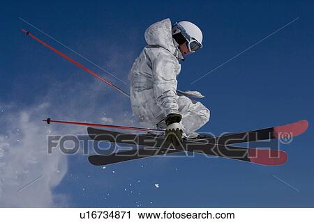 Man in white & grey camo suit grabbing. View Large Photo Image Stock Image - Man in white & grey camo suit grabbing.. Fotosearch