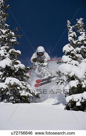 Man in white & grey suit airing gap. View Large Photo Image Stock Photograph - Man in white & grey suit airing gap.. Fotosearch