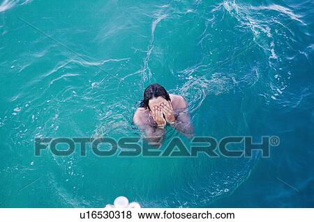 man surfacing View Large Photo Image Stock Photo - man surfacing. Fotosearch