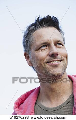 Stock Image - Man Wearing Hoody. Fotosearch