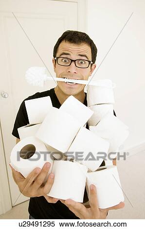 Man with toilet brush and toilet rolls View Large Photo Image Stock Photography - Man with toilet brush and toilet rolls. Fotosearch