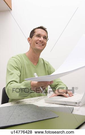 man working at home View Large Photo Image Stock Photo - man working at home. Fotosearch
