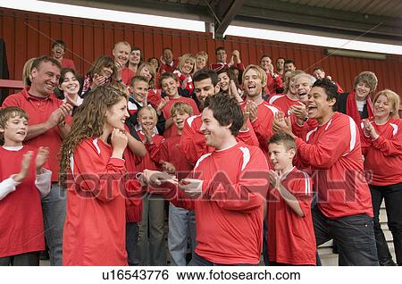 Marriage proposal at football match View Large Photo Image Stock Photograph - Marriage proposal at football match. Fotosearch
