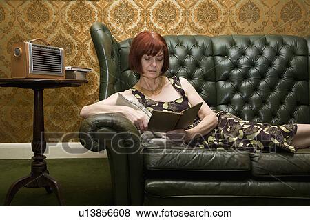 Mature lady reading book View Large Photo Image Stock Photo - Mature lady reading book. Fotosearch