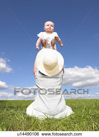 mother and baby in field View Large Photo Image Stock Photograph - mother and baby in field. Fotosearch