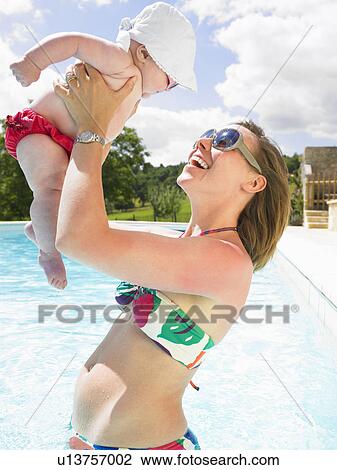 mother and baby in pool View Large Photo Image Stock Image - mother and baby in pool. Fotosearch