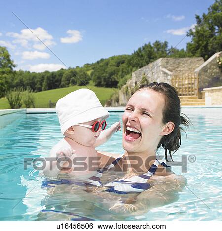 mother and baby in pool View Large Photo Image Stock Photograph - mother and baby in pool. Fotosearch