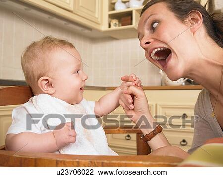 Stock Image - mother and baby. Fotosearch