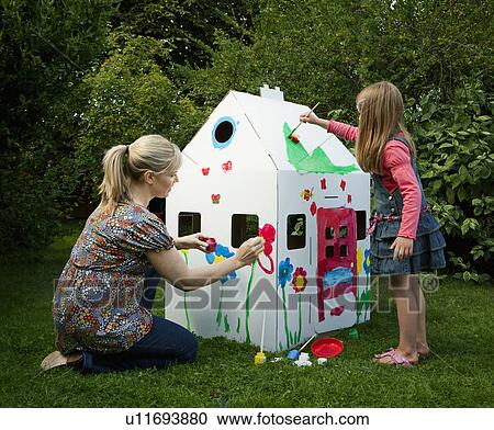 Mother and daughter painting together View Large Photo Image Stock Image - Mother and daughter painting together. Fotosearch