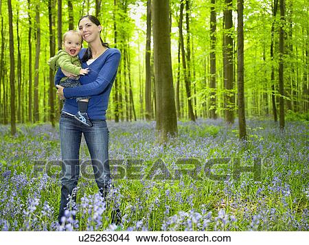 Mother and son in the woods View Large Photo Image Picture - Mother and son in the woods. Fotosearch