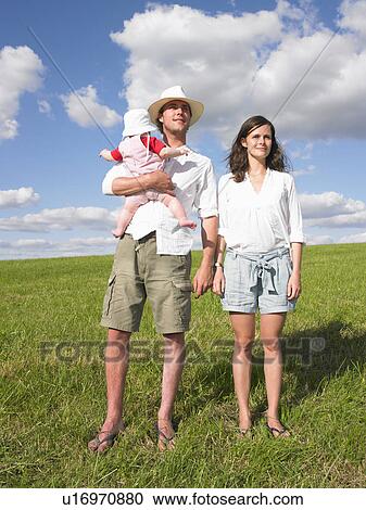mother, father and baby in field View Large Photo Image Stock Image - mother, father and baby in field. Fotosearch