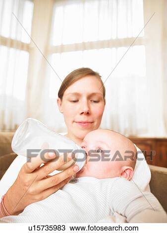 mother feeding baby View Large Photo Image Stock Image - mother feeding baby. Fotosearch