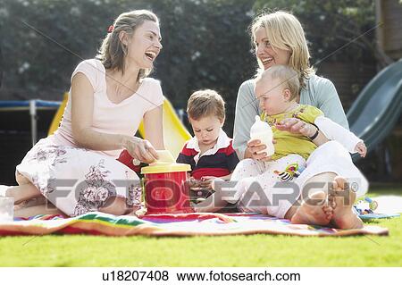mums having a picnic View Large Photo Image Stock Photo - mums having a picnic. Fotosearch