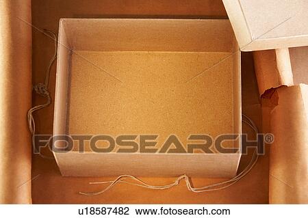 Overhead view of an empty cardboard box View Large Photo Image Stock Image - Overhead view of an empty cardboard box. Fotosearch