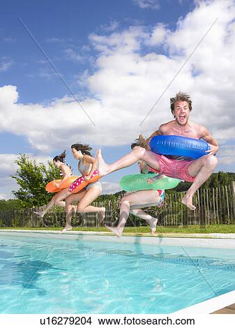 people jumping into pool View Large Photo Image Picture - people jumping into pool. Fotosearch