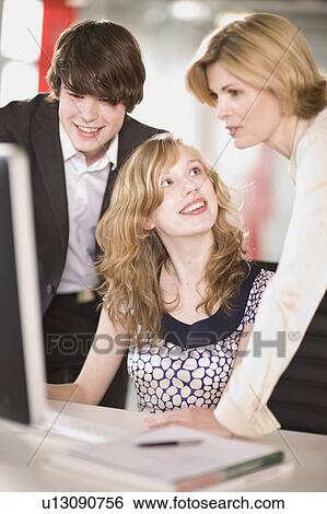 people working in an office View Large Photo Image Stock Photograph - people working in an office. Fotosearch