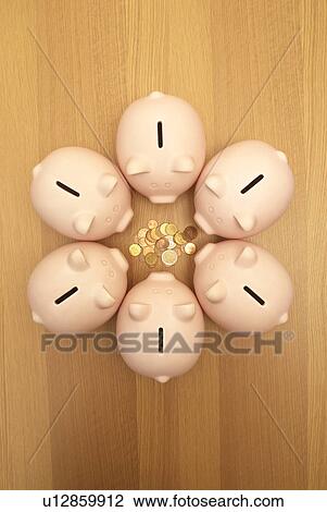 piggy banks guarding coins View Large Photo Image Stock Image - piggy banks guarding coins. Fotosearch
